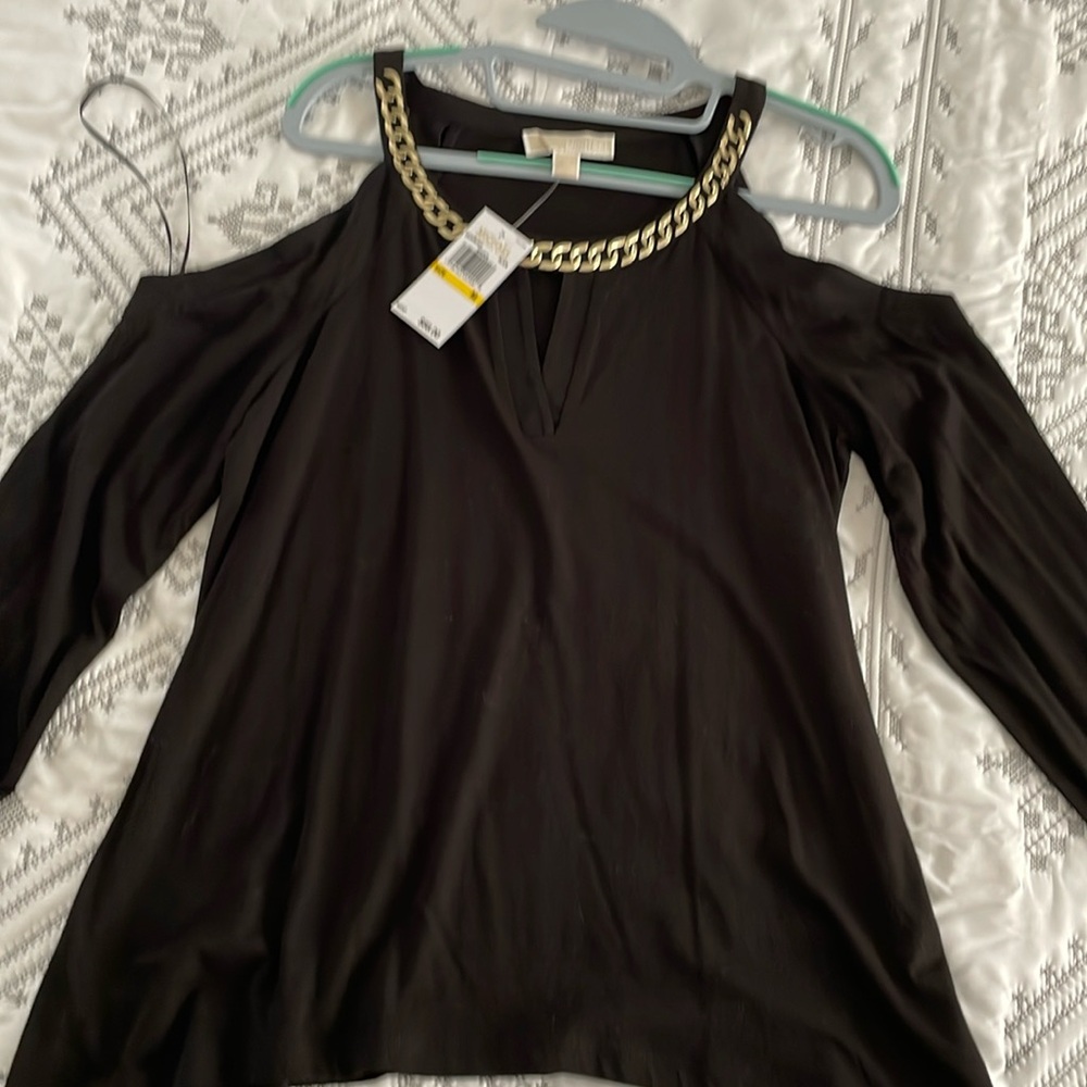 Woman’s Michael Kors black long sleeve top